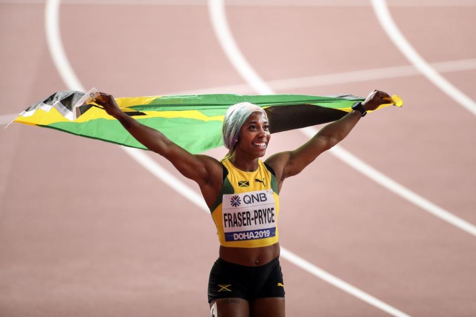 Shelly-Ann Fraser-Pryce of Jamaica celebrates winning the women's 100m final during the IAAF World Athletics Championships 2019 at the Khalifa Stadium in Doha, Qatar, 29 September 2019.<span class="copyright">Serhat Cagdas—Anadolu Agency via Getty Images</span>
