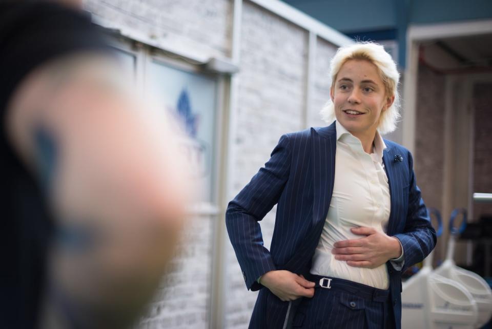 Toronto Six goaltender Carly Jackson shows off the custom detailing on her game day suit, before playing the Connecticut Whale during a home game at Canlan Sports at York University in Toronto, on Saturday, January 21, 2023.  THE CANADIAN PRESS/Tijana Martin