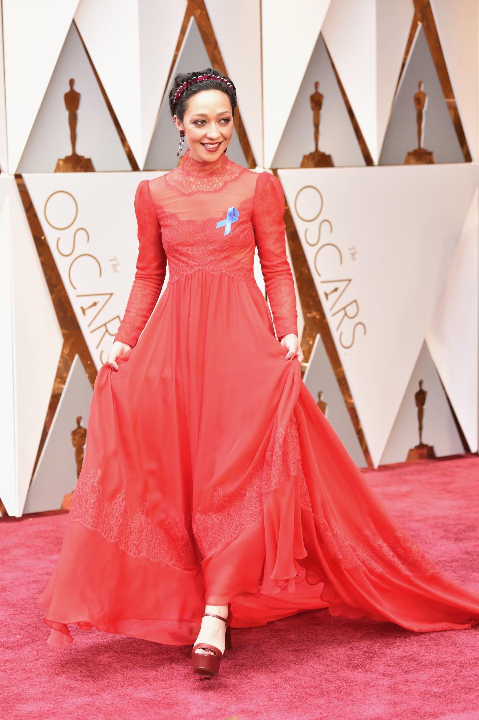 Why These Celebs Are Wearing Blue Ribbons on the Oscars Red Carpet