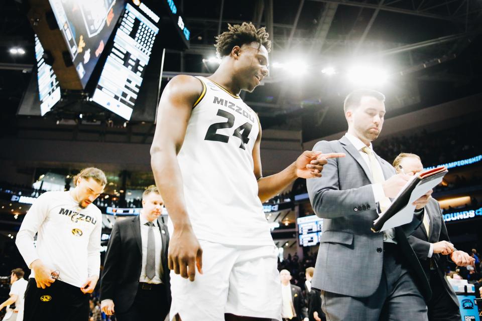 Missouri's Kobe Brown (24) talks with MU assistant Matt Cline during Princeton's 78-63 win in the Second Round of the NCAA Tournament on March 18, 2023, in Sacramento, Calif.