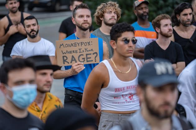 The author (center, in blue shirt) seen at a July 21 demonstration in New York City, calling for government action to combat the spread of monkeypox. (Photo: Jeenah Moon via Getty Images)