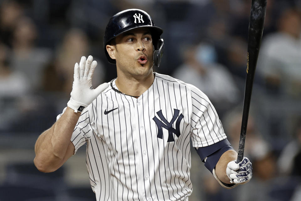 New York Yankees' Giancarlo Stanton reacts to flying out against the Baltimore Orioles during the sixth inning of a baseball game Friday, Sept. 3, 2021, in New York. (AP Photo/Adam Hunger)