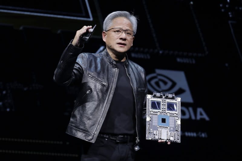 <cite>2024年6月2日。Nvidia執行長黃仁勳在台北舉行的 Computex 2024 展會上發表演講。（美聯社）</cite>