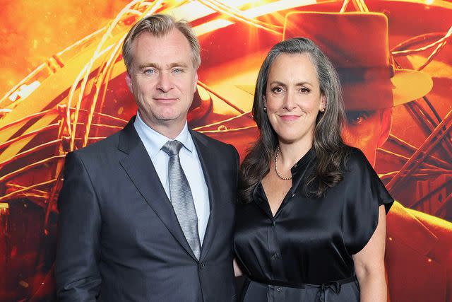 <p>Kevin Mazur/Getty</p> Christopher Nolan and wife Emma Thomas attend a screening of <em>Oppenheimer</em> in New York City on July 17, 2023