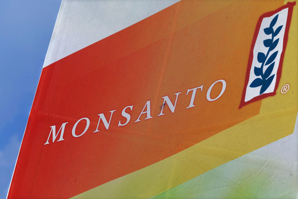 FILE - The Monsanto logo is seen on display at the Farm Progress Show in Decatur, Ill., on Aug. 31, 2015. Monsanto has agreed to pay Oregon a lump sum of $698 million for its role in polluting the state with PCBs over a 90-year period until they were banned in 1977. Oregon Attorney General Ellen Rosenblum said Thursday, Dec. 15, 2022, that the settlement amount is the largest environmental damage recovery in Oregon's history. (AP Photo/Seth Perlman, File)