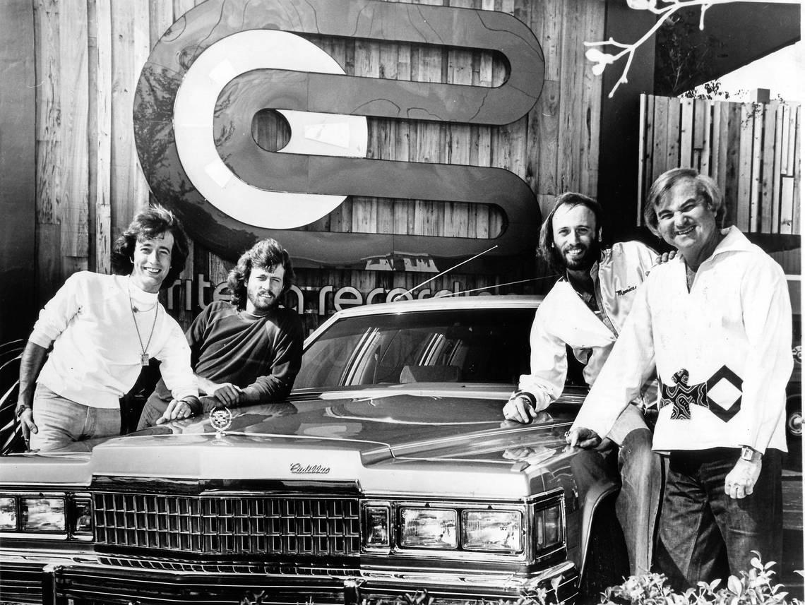 --hand out--The Bee Gees outside Criteria Studios in North Miami in 1978 with a platinum Cadillac they got as a gift from producer Robert Stigwood. From left: Robin, Barry and Mauruce Gibb, and Criteria owner Mack Emerman.