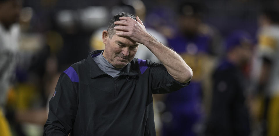 FILE - Minnesota Vikings coach Mike Zimmer wipes his head as he walks off the field after the team's 36-28 win over the Pittsburgh Steelers in an NFL football game Thursday, Dec. 9, 2021, in Minneapolis. The Minnesota Vikings fired general manager Rick Spielman and head coach Mike Zimmer on Monday, Jan. 10, 2022, according to a person with knowledge of the decision, after a second straight absence from the playoffs. The person spoke on condition of anonymity because the Vikings had not yet made the announcement. (Jerry Holt/Star Tribune via AP, File)