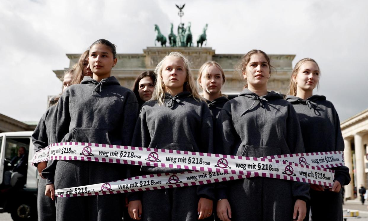 <span>Abortion rights activists stage a protest in Berlin, Germany.</span><span>Photograph: Carsten Koall/Getty Images</span>