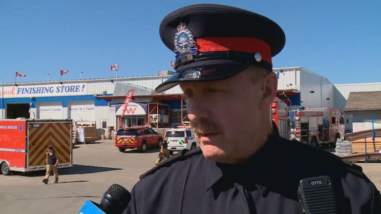 Toppled shelves trap, injure 4 workers at northeast Edmonton building supply company