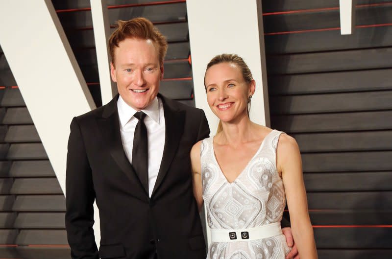 Conan O'Brien (L) and Liza Powel attend the Vanity Fair Oscar party in 2016. File Photo by David Silpa/UPI