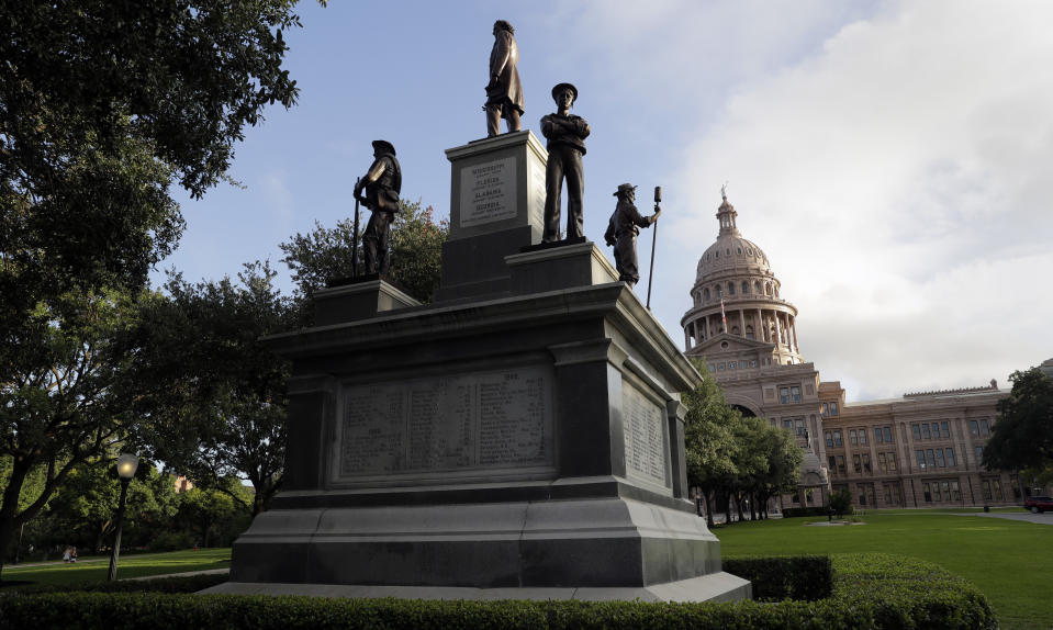 FILE - In this Aug. 21, 2017 file photo, the Texas State Capitol Confederate Monument stands on the south lawn in Austin, Texas. As a racial justice reckoning continues to inform conversations across the country, lawmakers nationwide are struggling to find solutions to thousands of icons saluting controversial historical figures. (AP Photo/Eric Gay, File)