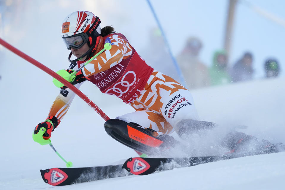 Slovakia's Petra Vlhova speeds down the course during the first run of an alpine ski World Cup women's slalom race, in Levi, Finland, Sunday, Nov. 12, 2023. (AP Photo/Giovanni Auletta)