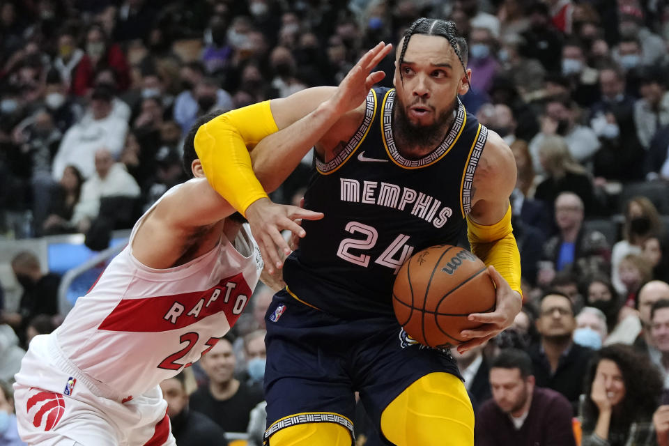 Toronto Raptors centre Khem Birch (24) drives past Toronto Raptors guard Fred VanVleet (23) during the first half of an NBA basketball game Tuesday, Nov. 30, 2021, in Toronto. (Nathan Denette/The Canadian Press via AP)