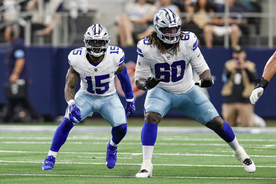 ARLINGTON, TX – SEPTEMBER 15: Dallas Cowboys offensive tackle Tyler Guyton (60) in action with running back Ezekiel Elliott (15) during the game between the Dallas Cowboys and the New Orleans Saints on September 15, 2024 at AT&T Stadium in Arlington, Texas. (Photo by Matthew Pearce/Icon Sportswire via Getty Images)