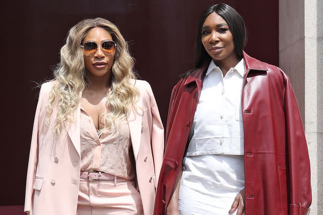 <p>Vittorio Zunino Celotto/Getty</p> Serena Williams and Venus Williams attend the Gucci Men's Spring Summer 2025 Fashion Show