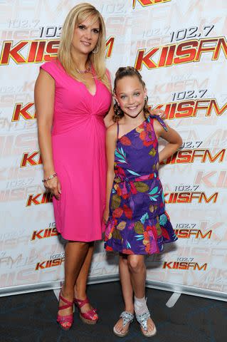 <p>Amanda Edwards/WireImage</p> Maddie Ziegler and mom Melissa Ziegler-Gisoni in 2012.