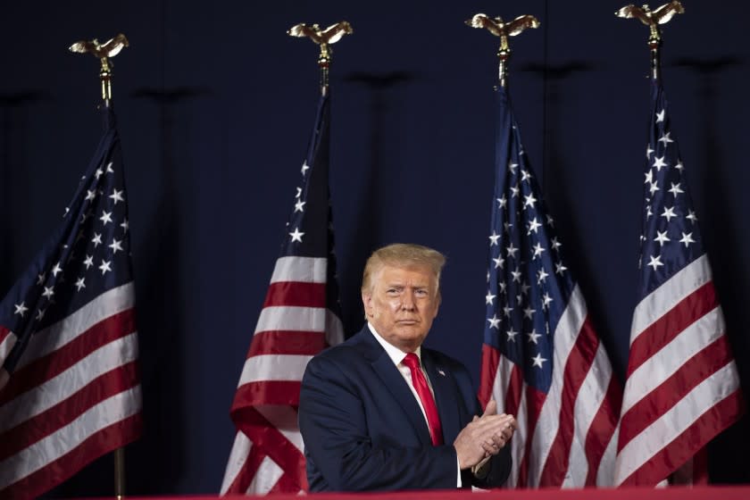 President Donald Trump applauds after speaking at Mount Rushmore National Memorial, Friday, July 3, 2020, near Keystone, S.D. (AP Photo/Alex Brandon)