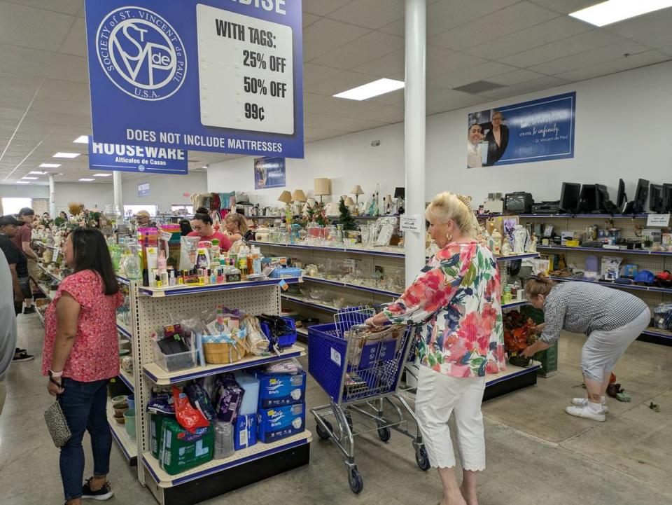 Shoppers browse the aisles at the new store.