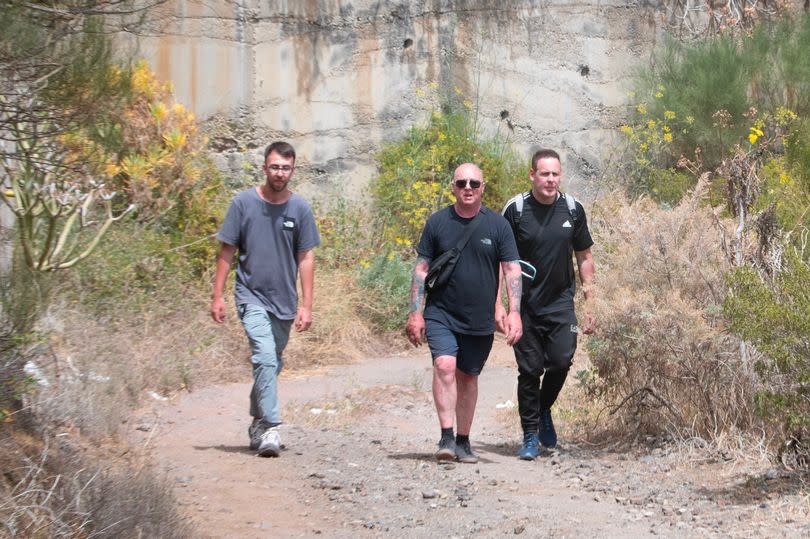 Dad Warren and brother Zak walking along the Juan Lopez Ravine close to Masca, where Jay's phone had last been located before he went missing
