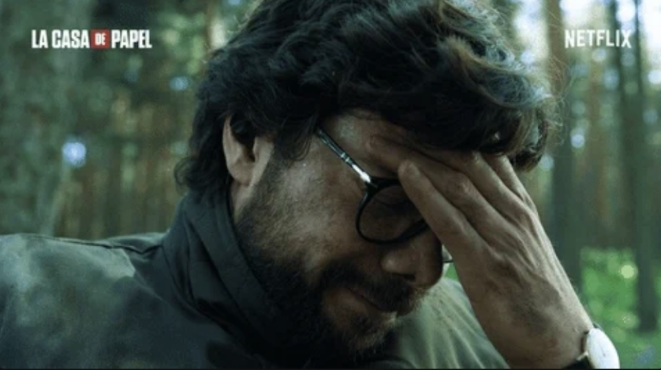 Álvaro Morte as The Professor in "La Casa de Papel" on Netflix, holding his head in distress