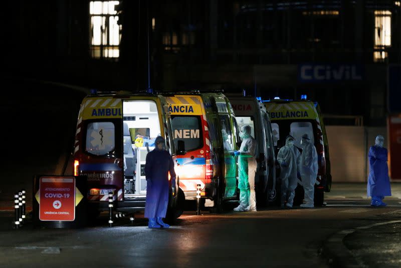 Ambulances with COVID-19 patients are seen waiting in Santa Maria hospital, as COVID-19 patients are being transferred from another hospital after a oxygen supply malfunction, amid the coronavirus disease (COVID-19) pandemic in Lisbon