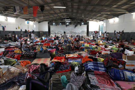 Migrants are seen at the Anti-Illegal Immigration Agency in Tajora shelter center in Tripoli, Libya April 24, 2019. REUTERS/Ahmed Jadallah