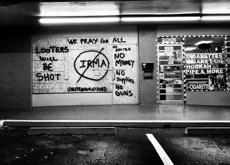 <p>A store window remained boarded up after Hurricane Irma in Clearwater, Fla. (Photo: Holly Bailey/Yahoo News) </p>