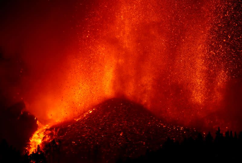 Lava rises downhill following the eruption of a volcano in Spain