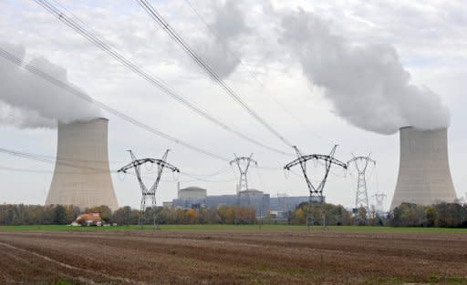 Pylons near cooling towers at the Golfech nuclear power plant, southwestern France, in 2009. "Energy-related carbon-dioxide (CO2) emissions in 2010 were the highest in history," the Paris-based IEA said in a statement posted on its website