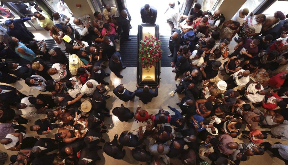 <p>The casket of Michael Brown exits Friendly Temple Missionary Baptist Church at the end of his funeral in St. Louis, Missouri August 25, 2014. Family, politicians and activists gathered for the funeral on Monday following weeks of unrest with at times violent protests spawning headlines around the world focusing attention on racial issues in the United States. (Robert Cohen/Pool/Reuters) </p>