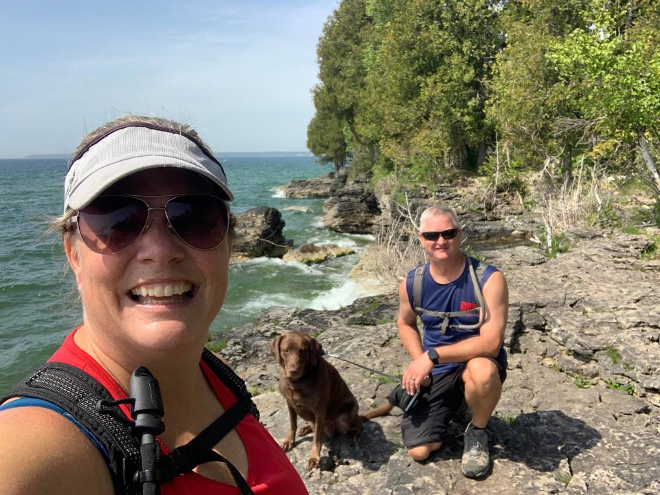 Joel and Deb pictured out on their travels with their dog Maya.