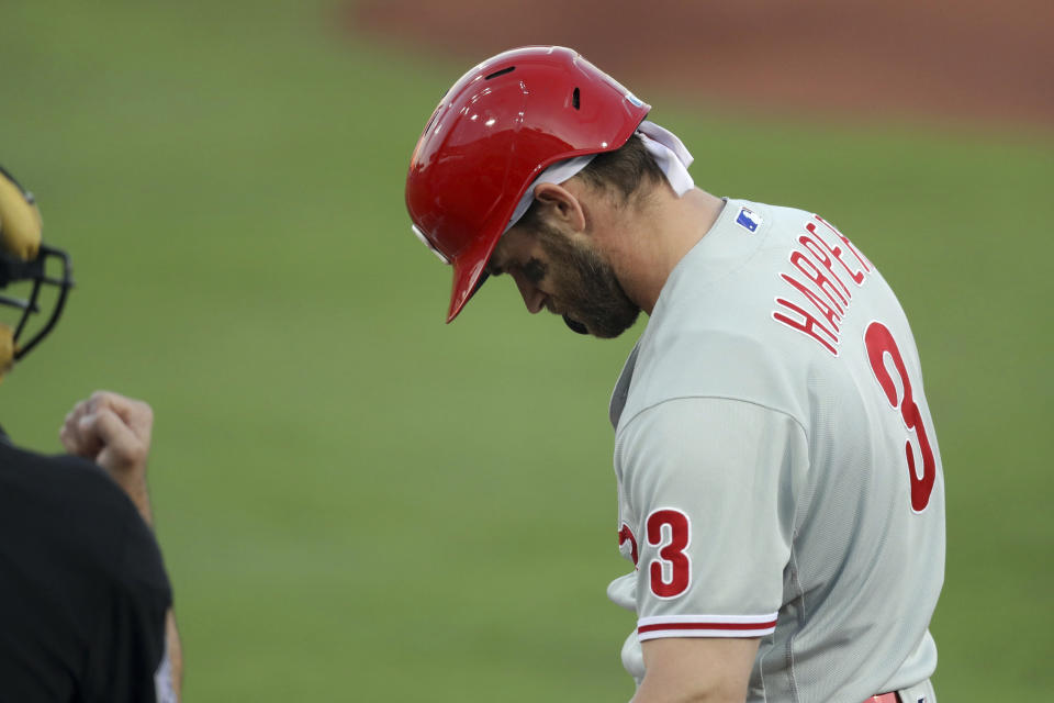 Philadelphia Phillies' Bryce Harper is called out on strikes during the first inning of a baseball game against the Toronto Blue Jays, Saturday, May 15, 2021, in Dunedin, Fla. (AP Photo/Mike Carlson)