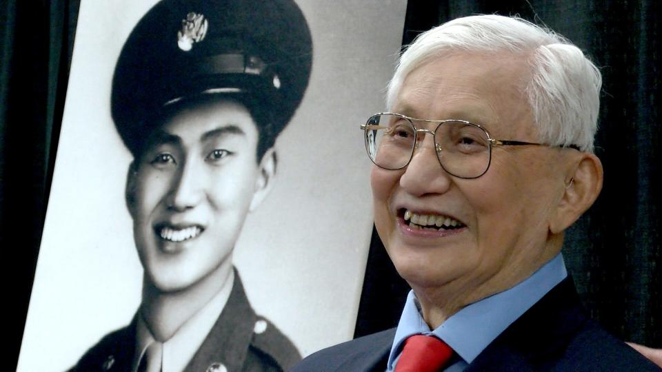 World War II veteran and retired United States Army Private First Class Edward L. Chan smiles after he was awarded with the insignia of the French Legion of Honor during a ceremony at Brookdale Community College Wednesday, April 6, 2022.  The presentation was made by French Consul General in New York Jérémie Robert .