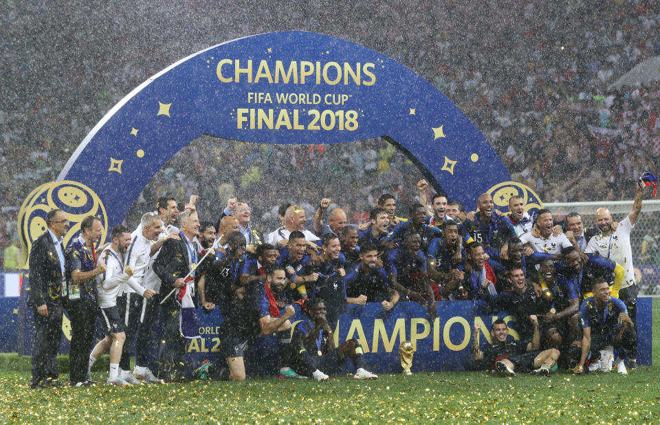 France celebrate with the trophy after winning the FIFA World Cup Final at the Luzhniki Stadium, Moscow. (Photo by Owen Humphreys/PA Images via Getty Images)