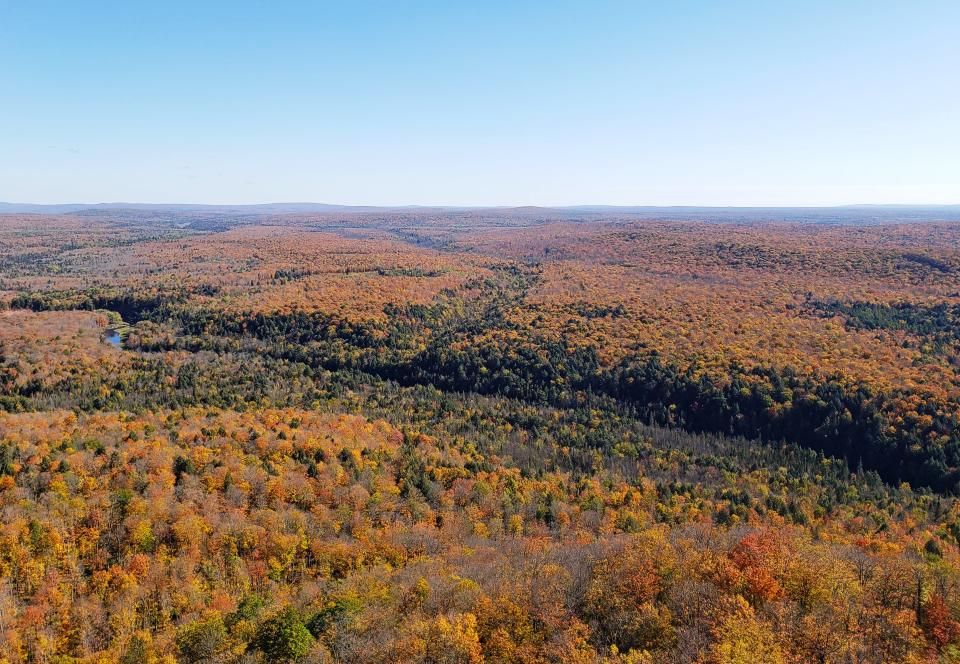 Copper Peak ski jump offers views of fall colors surrounding the Black River as it winds its way to Lake Superior in Ironwood, Mich., October 7, 2021.