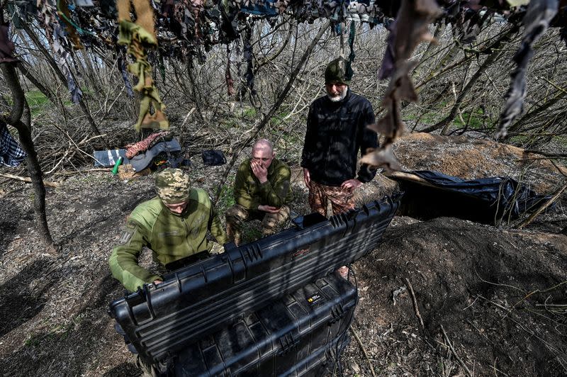 Ukrainian servicemen prepare an unmanned aerial vehicle at a position near a frontline in Zaporizhzhia region