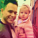 Celebrity photos: Olly Murs has been hanging out in America ahead of his tour with One Direction in a couple of weeks time. Whilst he takes in the sights, he’s also been meeting new fans – including this cute little one.