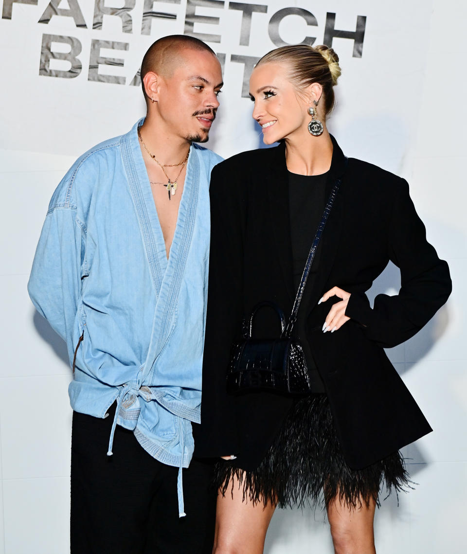 <p>Evan Ross and Ashlee Simpson Ross share a sweet look at the FARFETCH Beauty Launch Party in West Hollywood on May 10. </p>