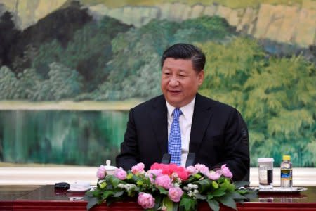 FILE PHOTO - Chinese President Xi Jinping speaks with Russian Foreign Minister Sergei Lavrov (not pictured) during a meeting at the Great Hall of the People in Beijing, China April 23, 2018. Naohiko Hatta/Pool via REUTERS