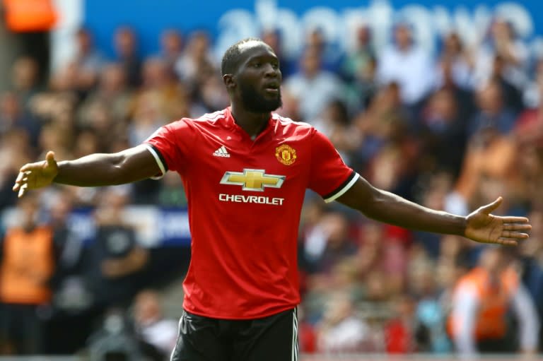 Manchester United's striker Romelu Lukaku celebrates scoring the team's second goal during the English Premier League football match against Swansea City August 19, 2017