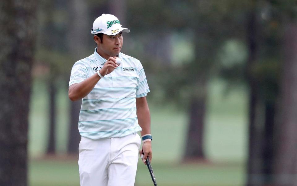 Hideki Matsuyama reacts after making an eagle on the 15th hole - CURTIS COMPTON