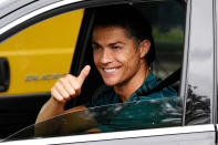 <p>Cristiano Ronaldo leaves a training center in Turin, Italy on Tuesday as the country's lockdown begins to lift. </p>