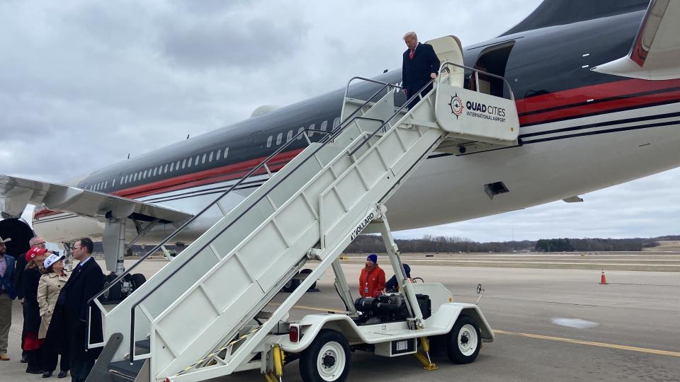 Former President Donald Trump arrives at the Quad Cities International Airport Monday, March 13, 2023, to deliver an education policy address at the Adler Theater in Davenport, Iowa. It is Trump's first return to Iowa after he announced he officially is running for president.