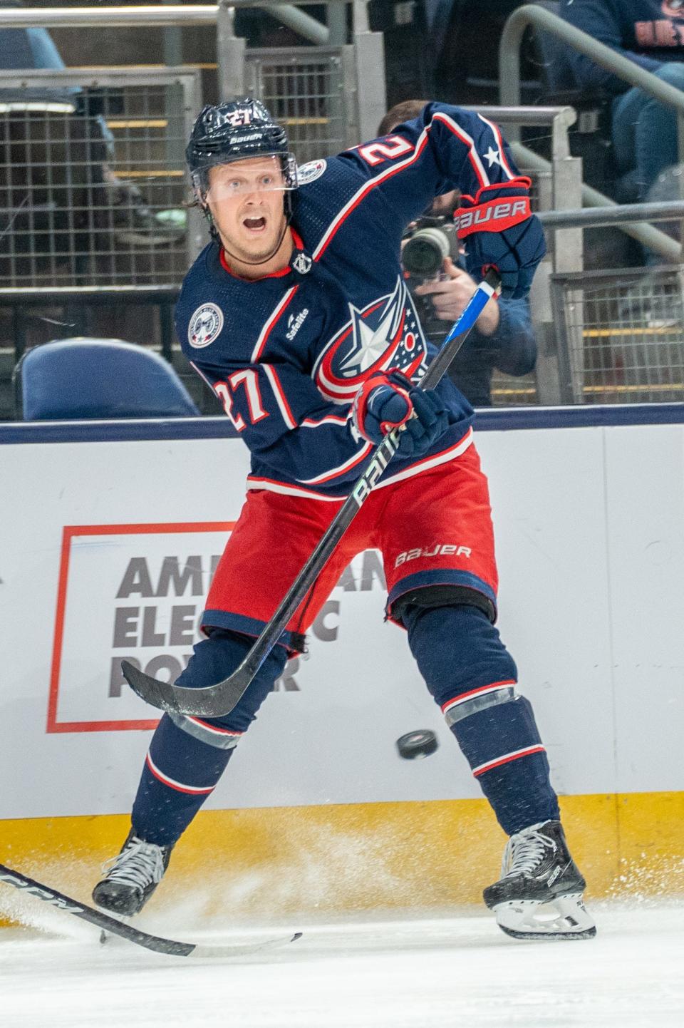 Oct. 5, 2023; Columbus, Ohio, United States;
Columbus Blue Jackets defenseman Adam Boqvist (27) passes the puck during their game against the Washington Capitals on Thursday, Oct. 5, 2023 at Nationwide Arena.