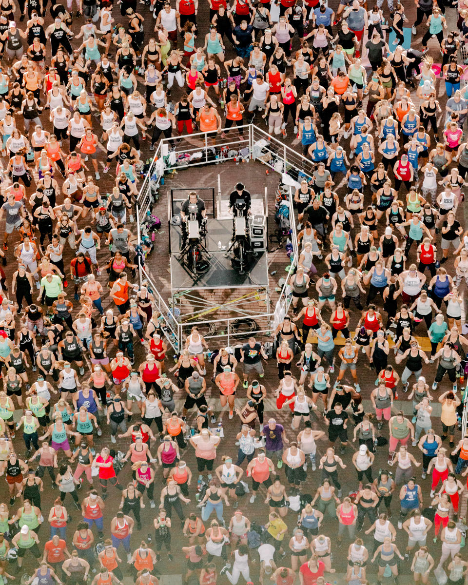 The Beachbody summit in 2019 drew thousands hoping to earn money selling the company’s products and fitness routines | Evan Jenkins for TIME