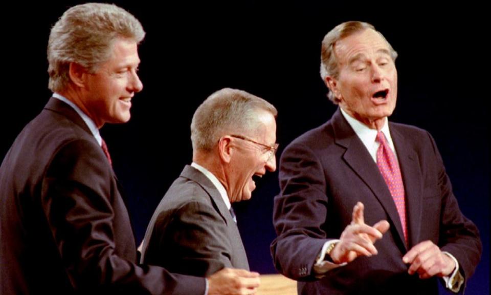 Ross Perot, center, takes part in a 1992 presidential debate as a third-party candidate alongside Bill Clinton, left, and George Bush.