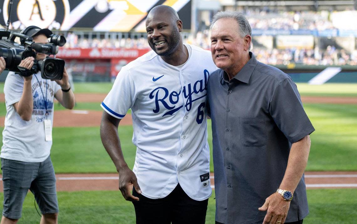 Former Kansas City Royals center fielder Lorenzo Cain hugs former Royals manager Ned Yost following a retirement ceremony at Kauffman Stadium on Saturday, May 6, 2023, in Kansas City. Cain signed a ceremonial one-day contract to retire as a Royal.