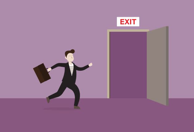 Businessman runs to the exit door<i></i> (Photo: tommy via Getty Images)