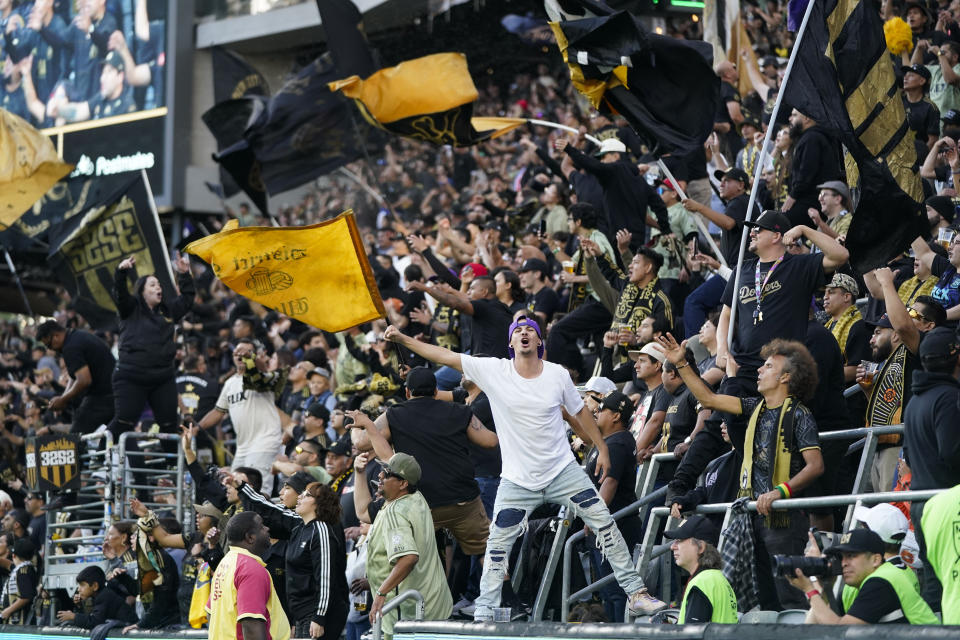 Fans cheer during the first half of an MLS soccer match between Los Angeles FC and Real Salt Lake, Sunday, Oct. 1, 2023, in Los Angeles. (AP Photo/Jae C. Hong)