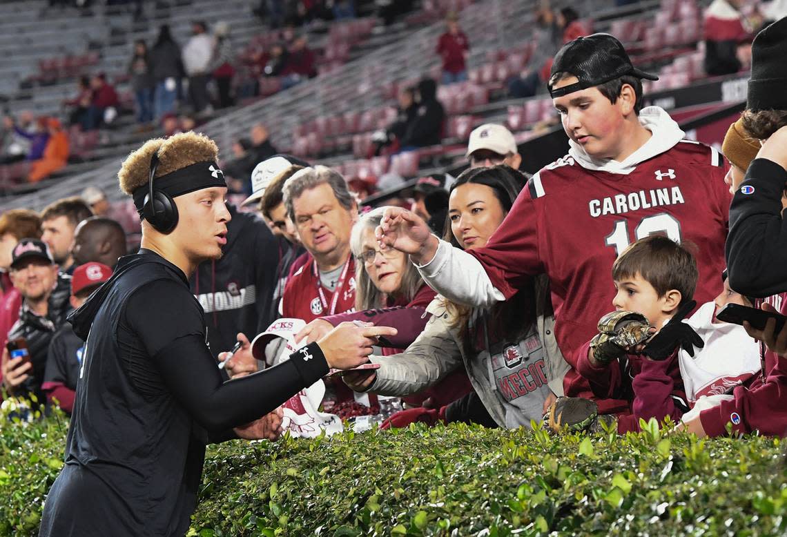 Nov 25, 2023; Columbia, South Carolina, USA;South Carolina quarterback Spencer Rattler (7) meets fans before the game with Clemson at Williams-Brice Stadium. Mandatory Credit: Ken Ruinard-USA TODAY Sports